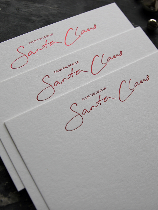 From The Desk Of Santa Claus notecards hand foiled in red text with an envelope that says North Pole Mail