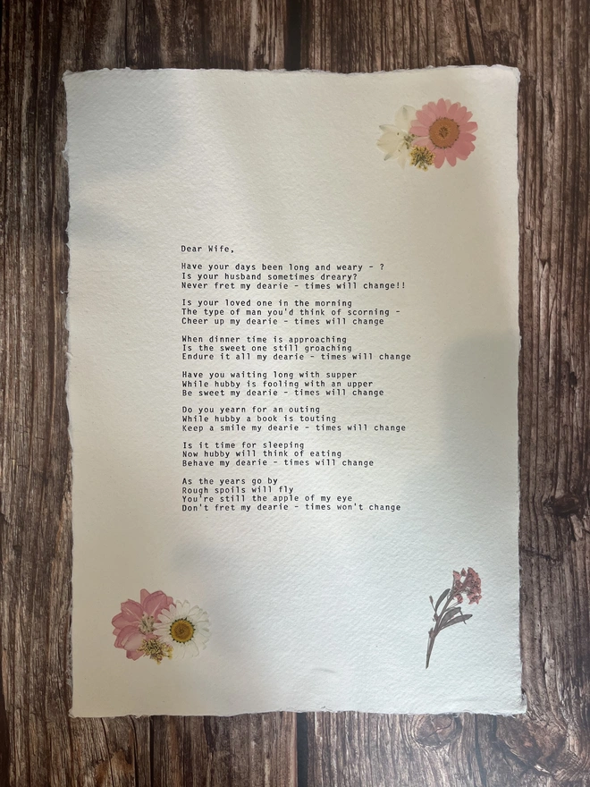 Antique vintage typewriter print hand typed onto cotton rag handmade deckled paper decorated with real dried pressed flowers