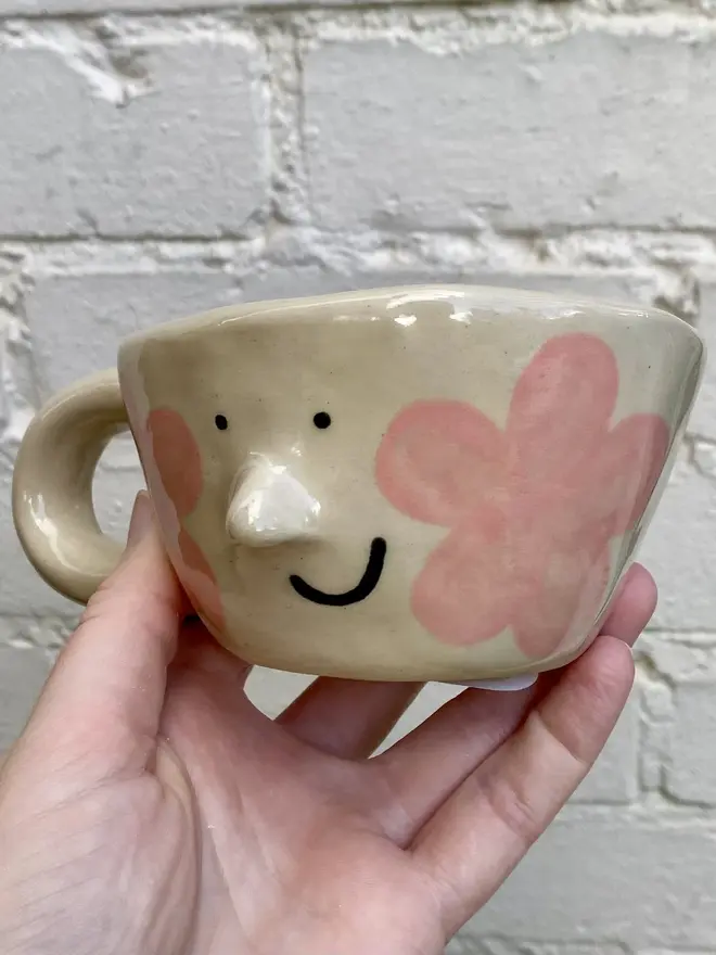 pink flower handmade ceramic smiley face mug