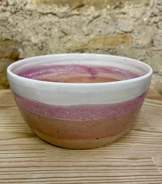 Ice Cream Sundae Ramen Bowl, a colourful ramen bowl sitting on a wooden surface against a brick backdrop. 