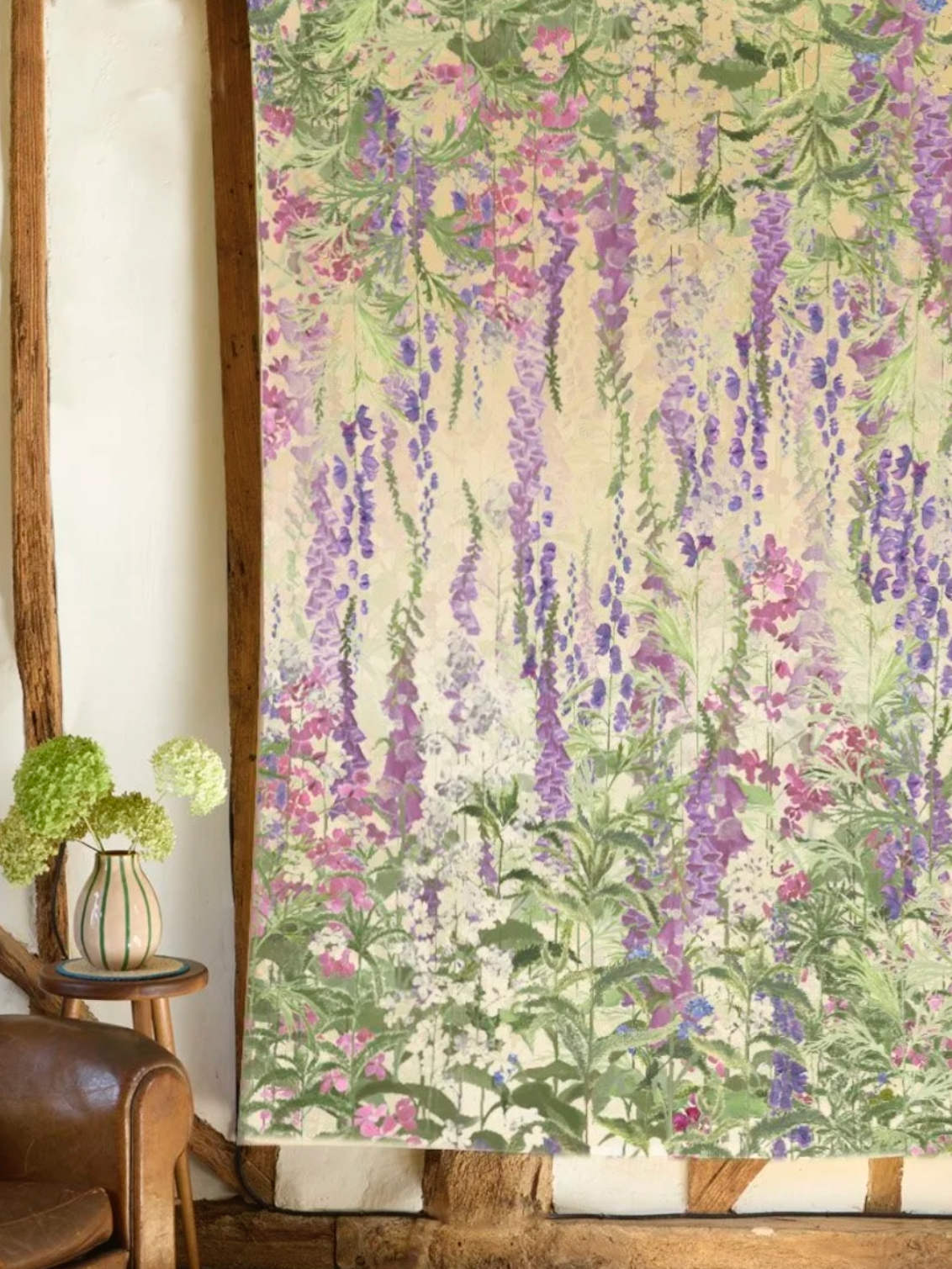 Horatio’s Garden Foxglove Tablecloth. A white tablecloth patterned with purple and green foxgloves.