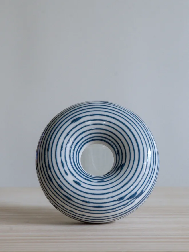 Avocado Planter White & Blue Handmade porcelain avocado planter with carved blue pattern, designed to hold an avocado seed for sprouting