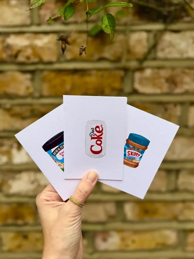 diet coke peanut butter and ice cream mini cards (pack of 3). card set photographed against brick wall backdrop.
