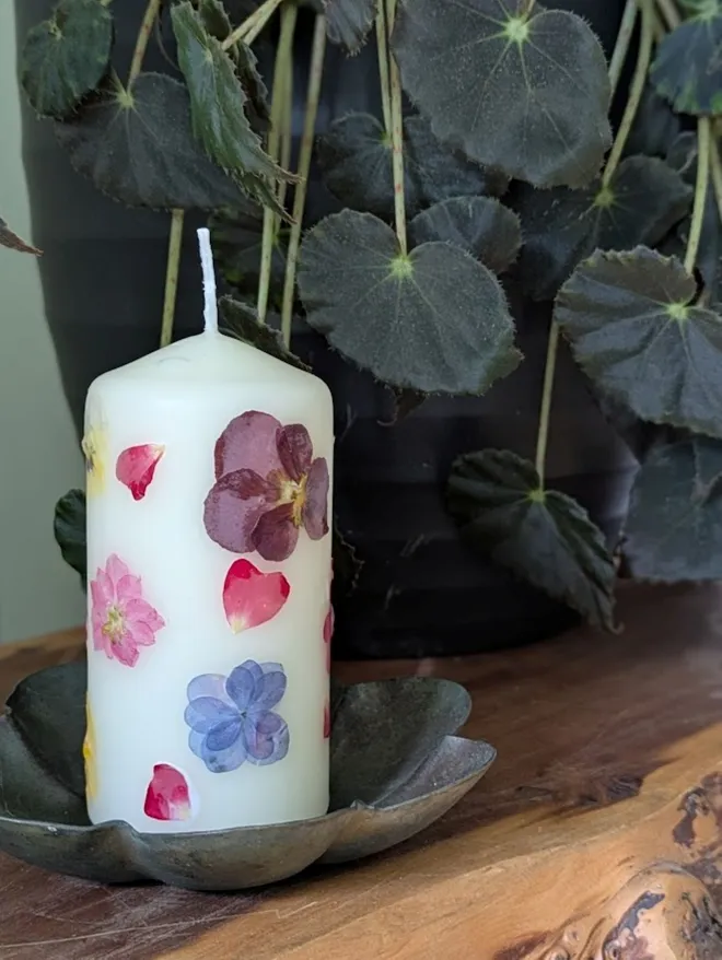 Handmade pillar Candles with Pressed Flower placed on tray