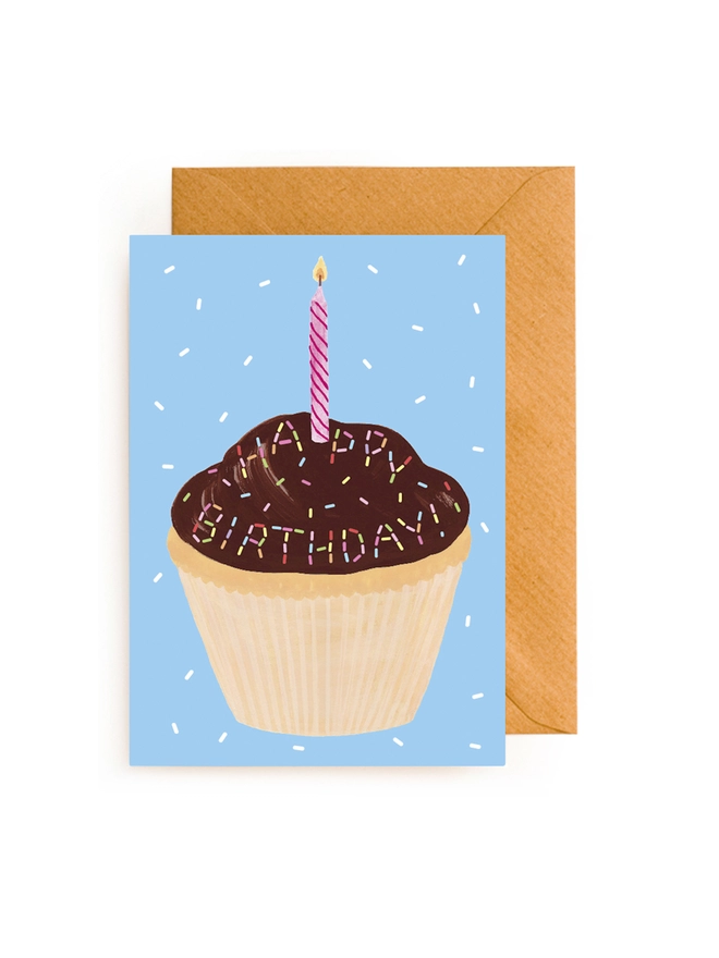 Scratch + Sniff greeting card with an image of a cupcake that says 'Happy Birthday' in rainbow sprinkles on it. 