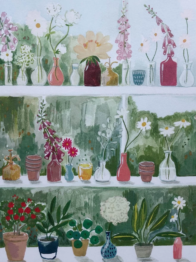 The print features shelving within a glasshouse. The white shelves are covered in small glass vessels holding single stems of daisies, foxgloves and hydrangeas. There are also terracotta posts that hold succulents and house plants.