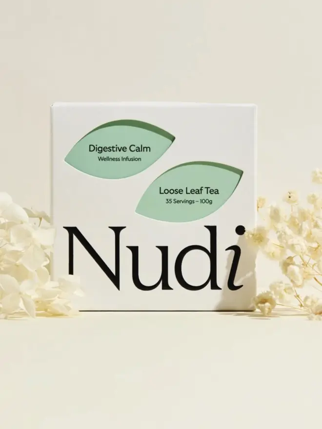 white box of digestive calm tea with teal leaf design