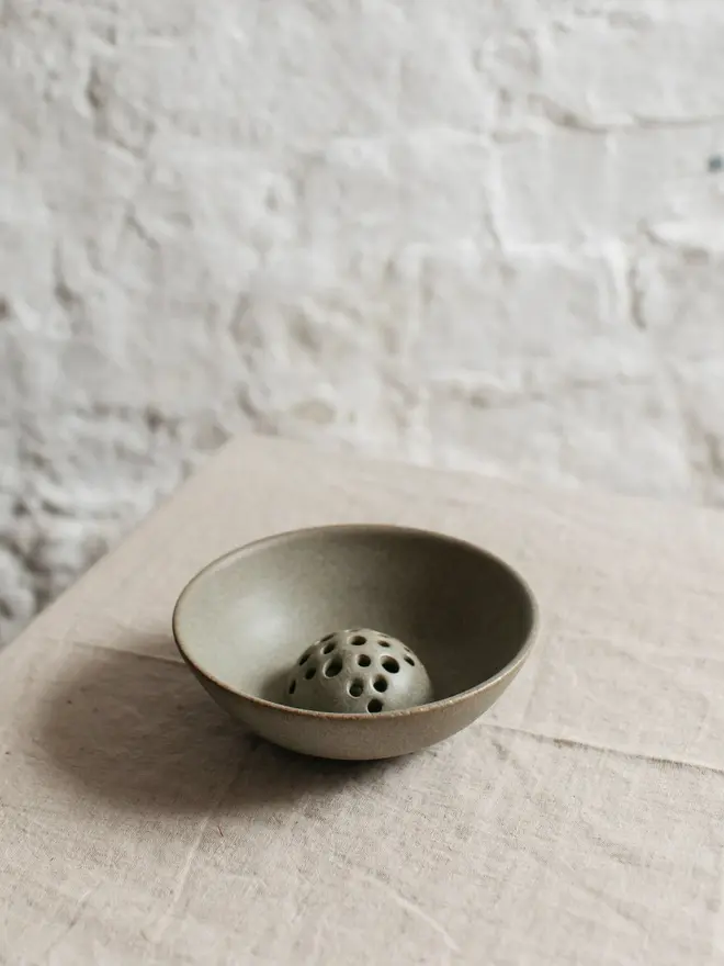 green stoneware flower bowl