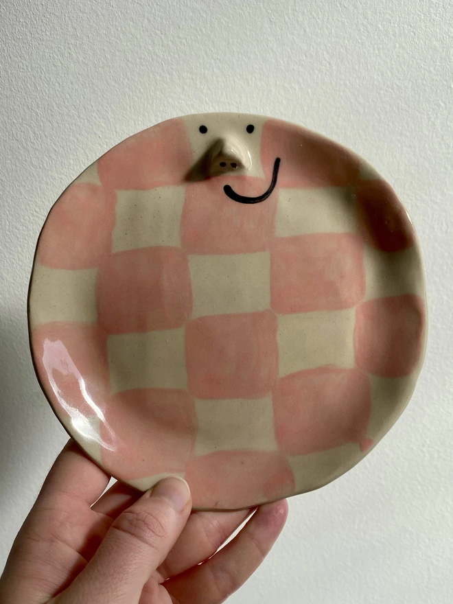 pink checkerboard sideplate front
