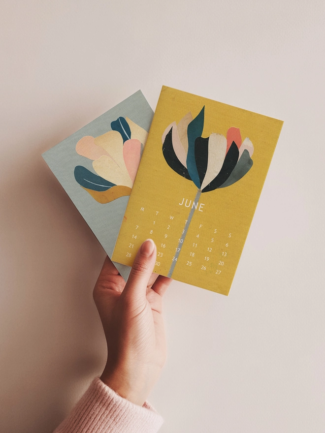 A small unbound at-a-glance calendar to display on the desk or wall.