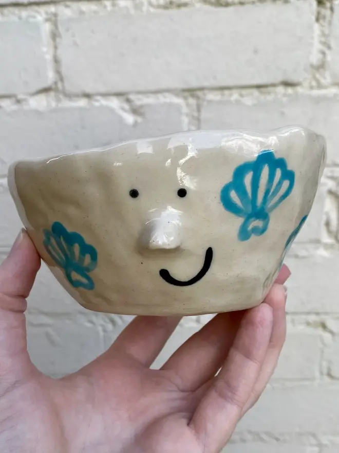 blue shell handmade ceramic smiley face pot