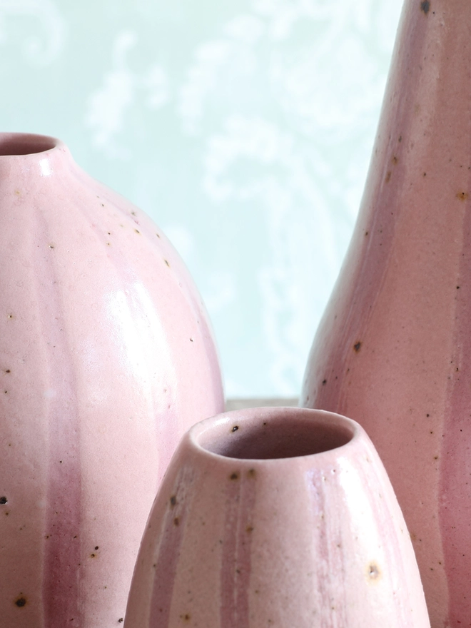 Close-up photograph of our Handmade Ceramic Stoneware Vases in Pink Stripe in three different sizes: small, medium and large. 