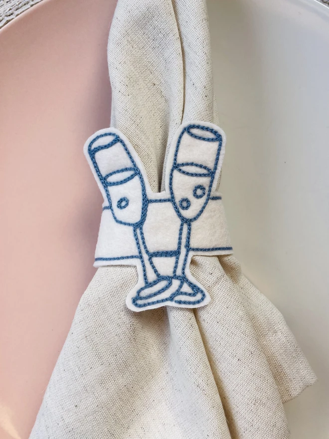 Embroidered champagne napkin ring