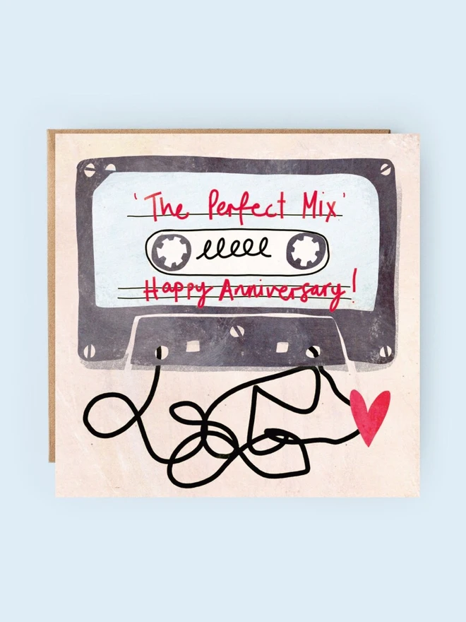 'perfect mix' illustrated anniversary card. card photographed against plain white backdrop.