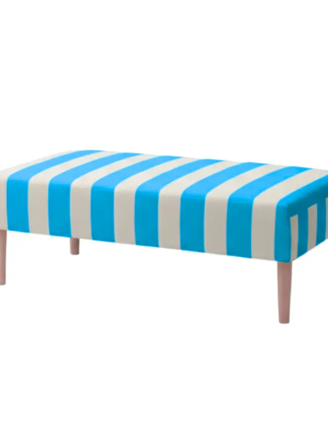 Hand Painted Upholstered Striped Linen Coffee Table Ottoman, neon blue coffee table sitting against a white backdrop. 