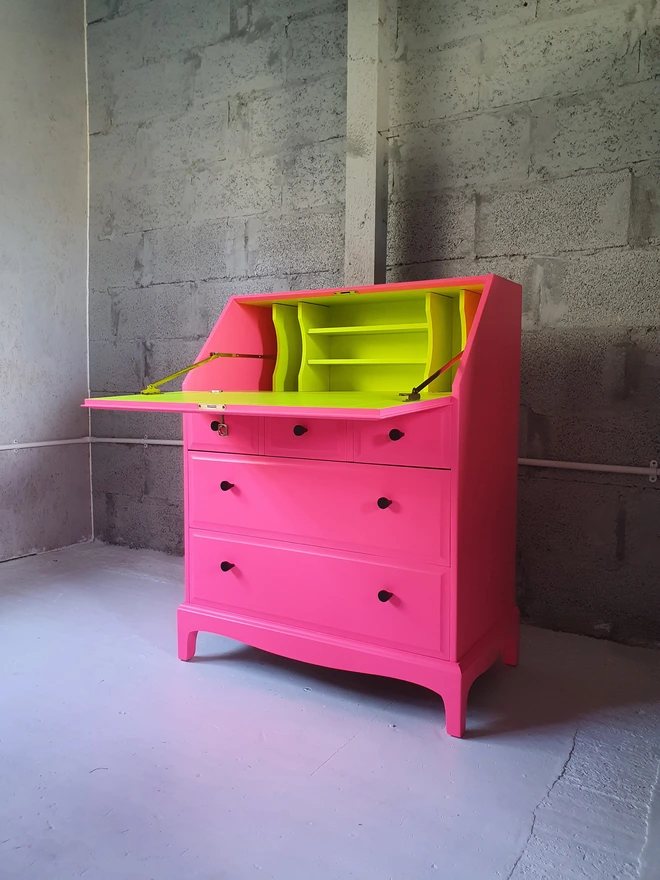 neon pink yellow bureau desk