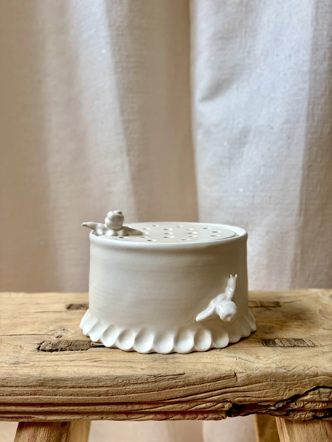 Ceramic flower brick with snails 