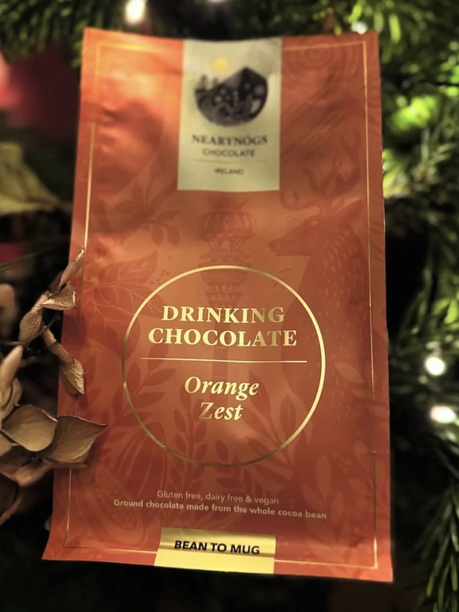 Drinking Chocolate 60% (Pack Of 200g/ 1kg), a packet of drinking chocolate sitting outside. 