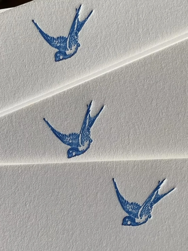 Personalised Swallow Correspondence Cards (Set Of 10, 20), white correspondence card with personalised blue name and swallow icon. 