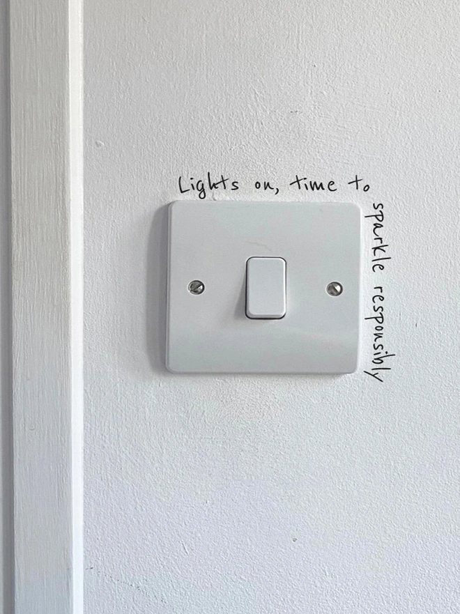 wall stick with a personlaised quote that goes around your light switch