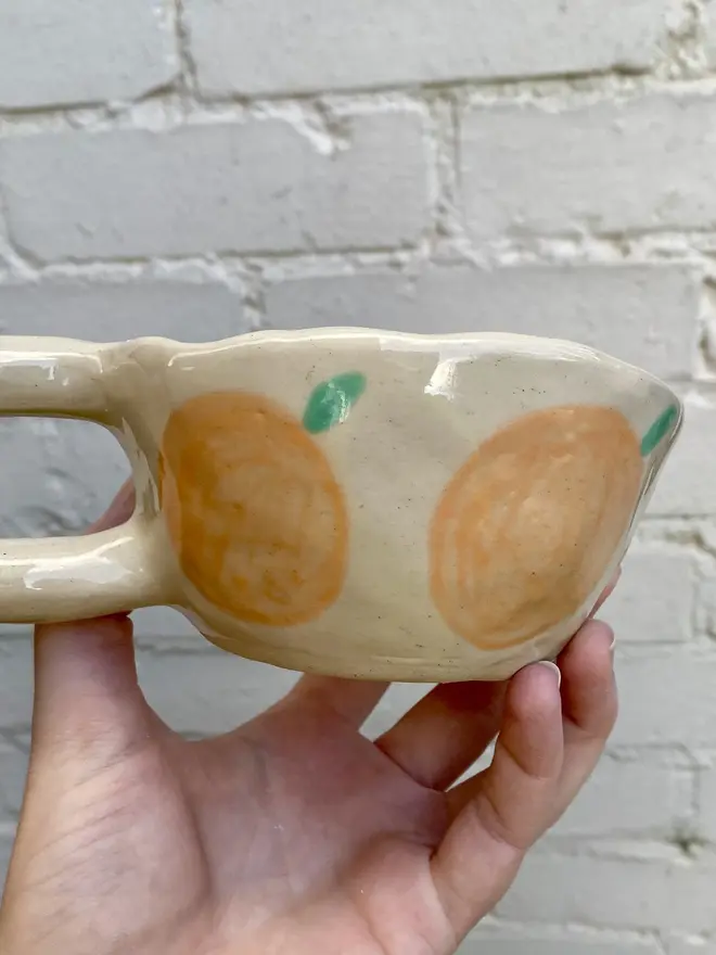 orange clementine handmade ceramic smiley face mug