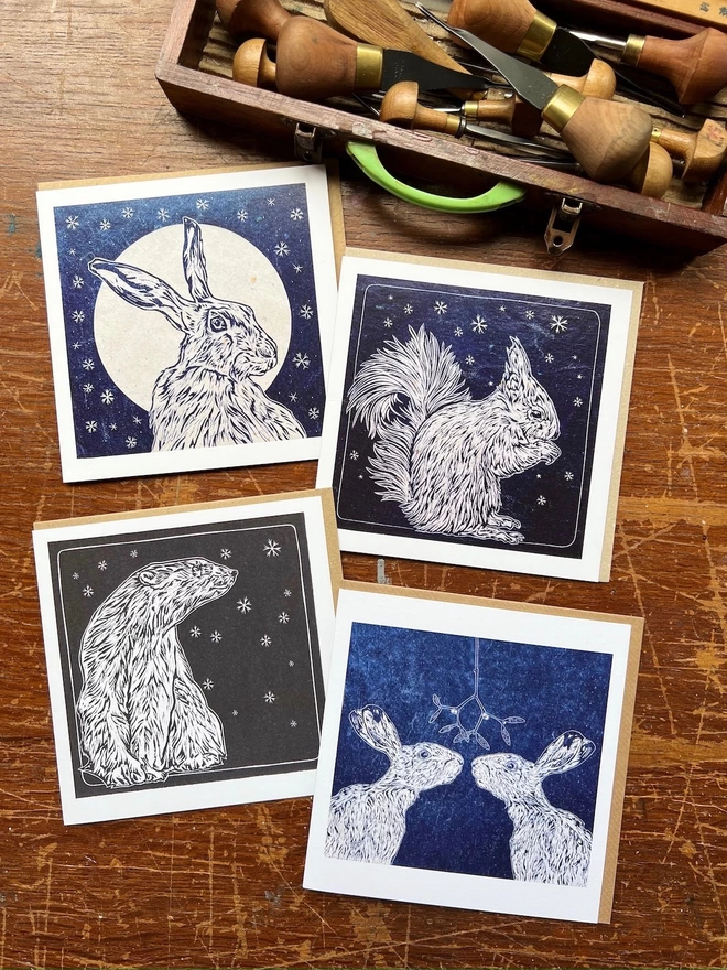 set of four winter snowflake animal cards