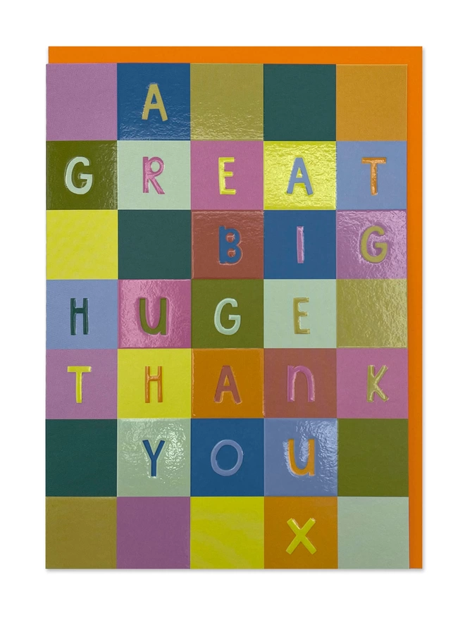 A colourful card with a bold rainbow check pattern ‘A Great Big Huge Thank You X’ message