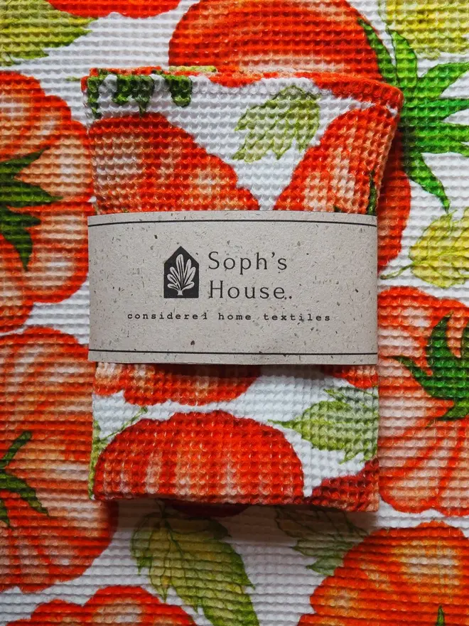 Tomato Waffle Tea towel, folded on another Tomato Waffle Tea towel.