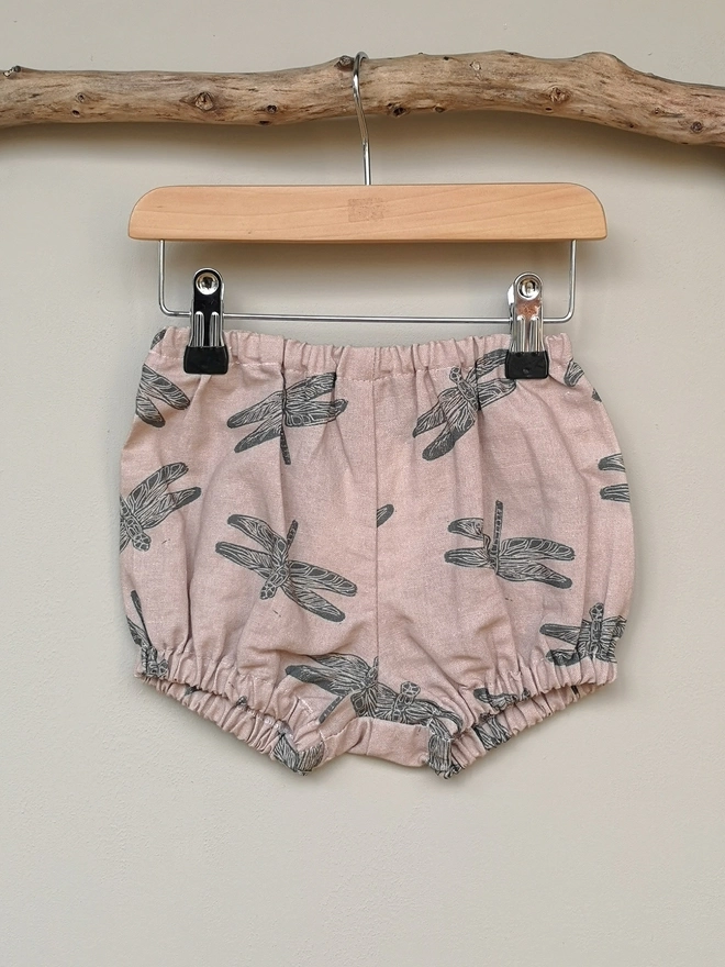 Pink Cotton Linen Baby Bloomers. Elasticated waist and leg holes. Featuring a delicate charcoal grey dragonfly print.