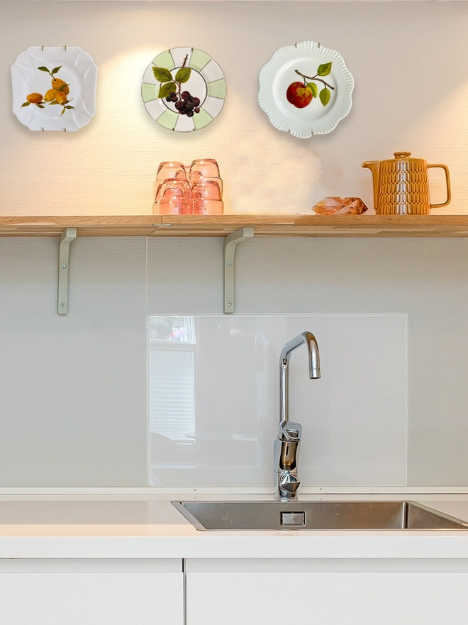 a line of plates on the wall