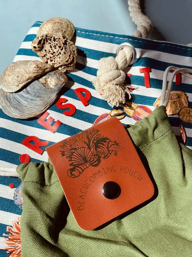 Personalised Foraging Drawstring Canvas Pouch, placed on a table. 