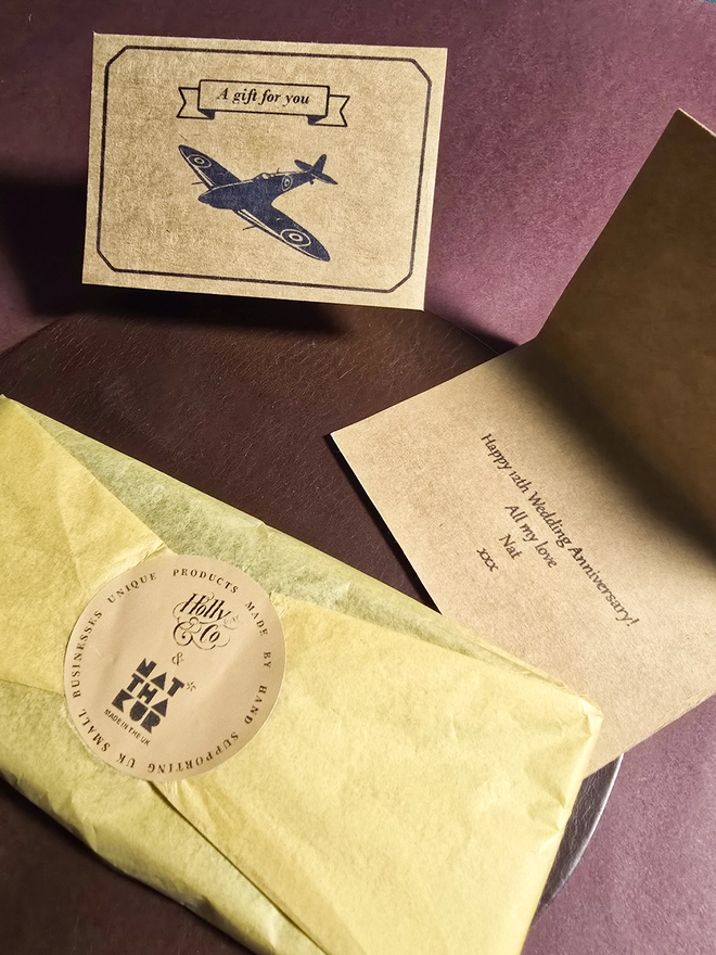 natthakur free gift wrapped leather pen case with a spitfire gift card and a personalised wedding anniversary message