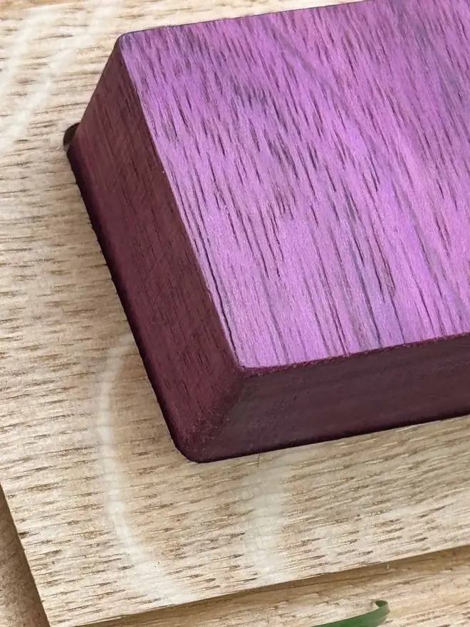Wooden Shape Tracing Puzzle Heirloom Toy, on a table. 