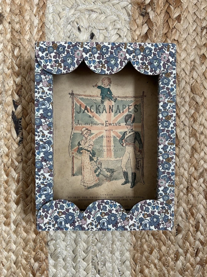 Liberty fabric covered mount frame with scallop edge with Jackanapes print