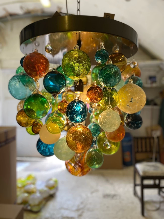 A bespoke chandelier hand-crafted from blown glass spheres
