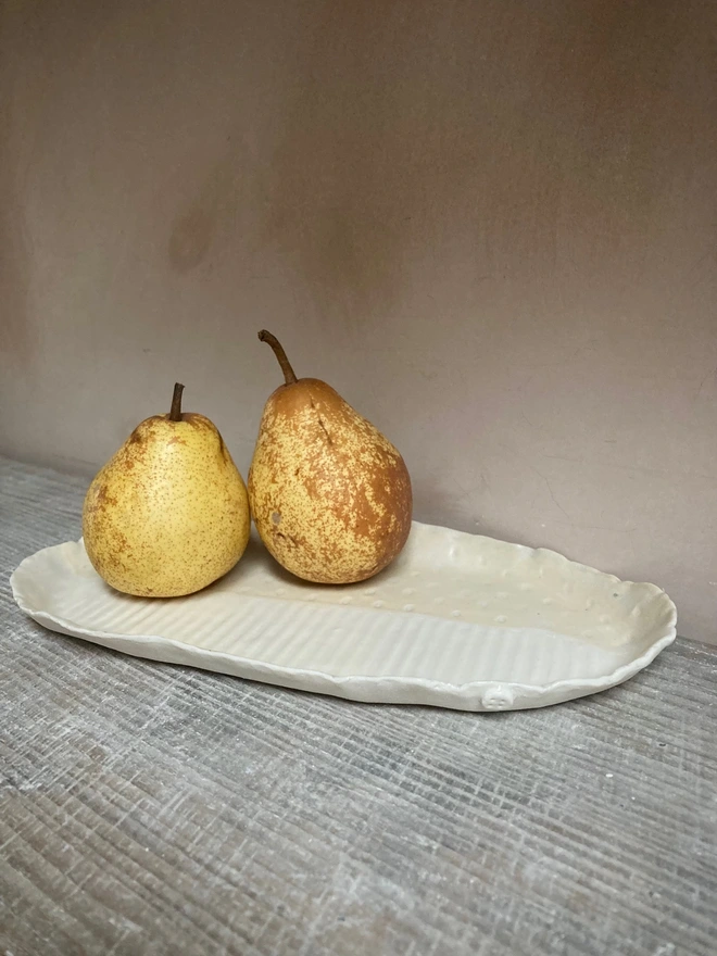 white porcelain platter with pears