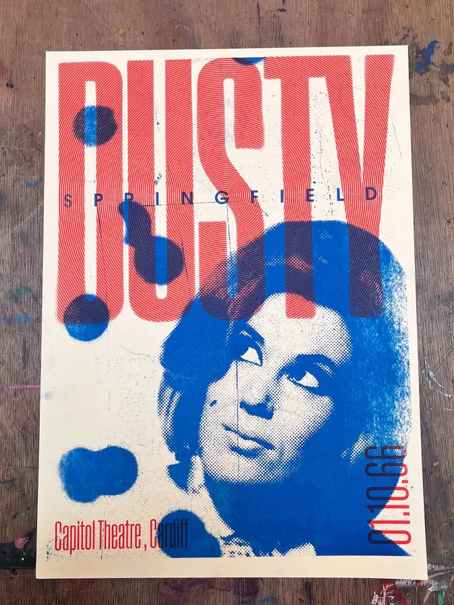 'Dusty Springfield' Handmade Risograph Gig Poster, hanging on a brown wall. 