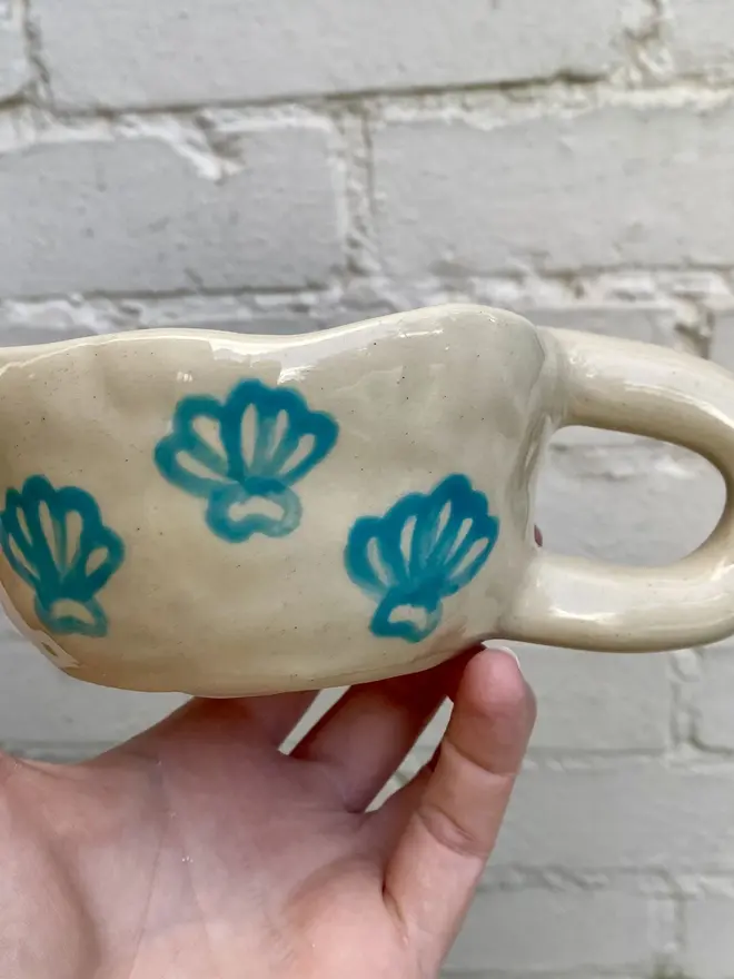 handmade ceramic smiley face shell mug