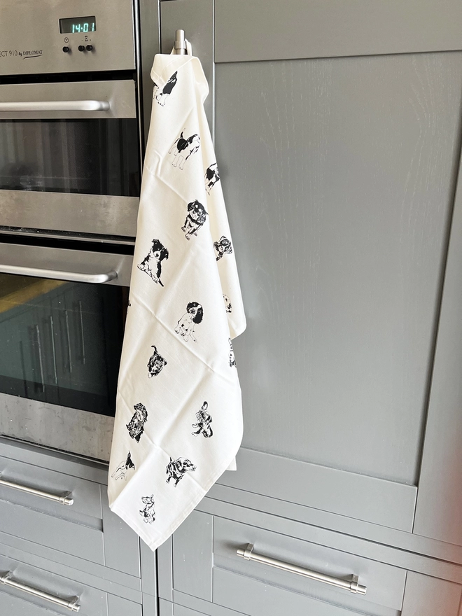 full image of a puppy tea towel brightening up the kitchen