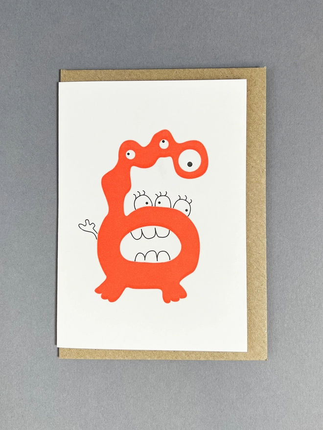 Letterpress printed neon orange number six card with envelope for chidren's birthday