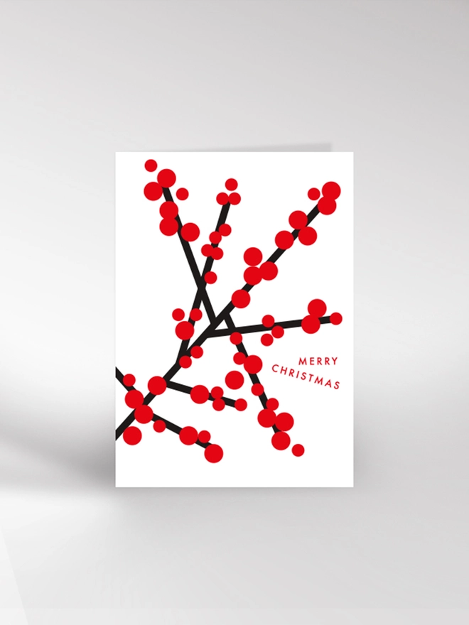 Contemporary illustrated card of red berries, saying Merry Christmas