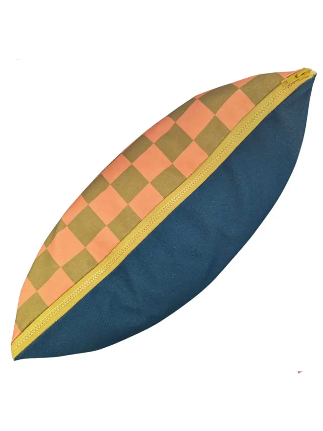 Cotton Print Patterned Cushion, a cushion sitting on a white surface. 