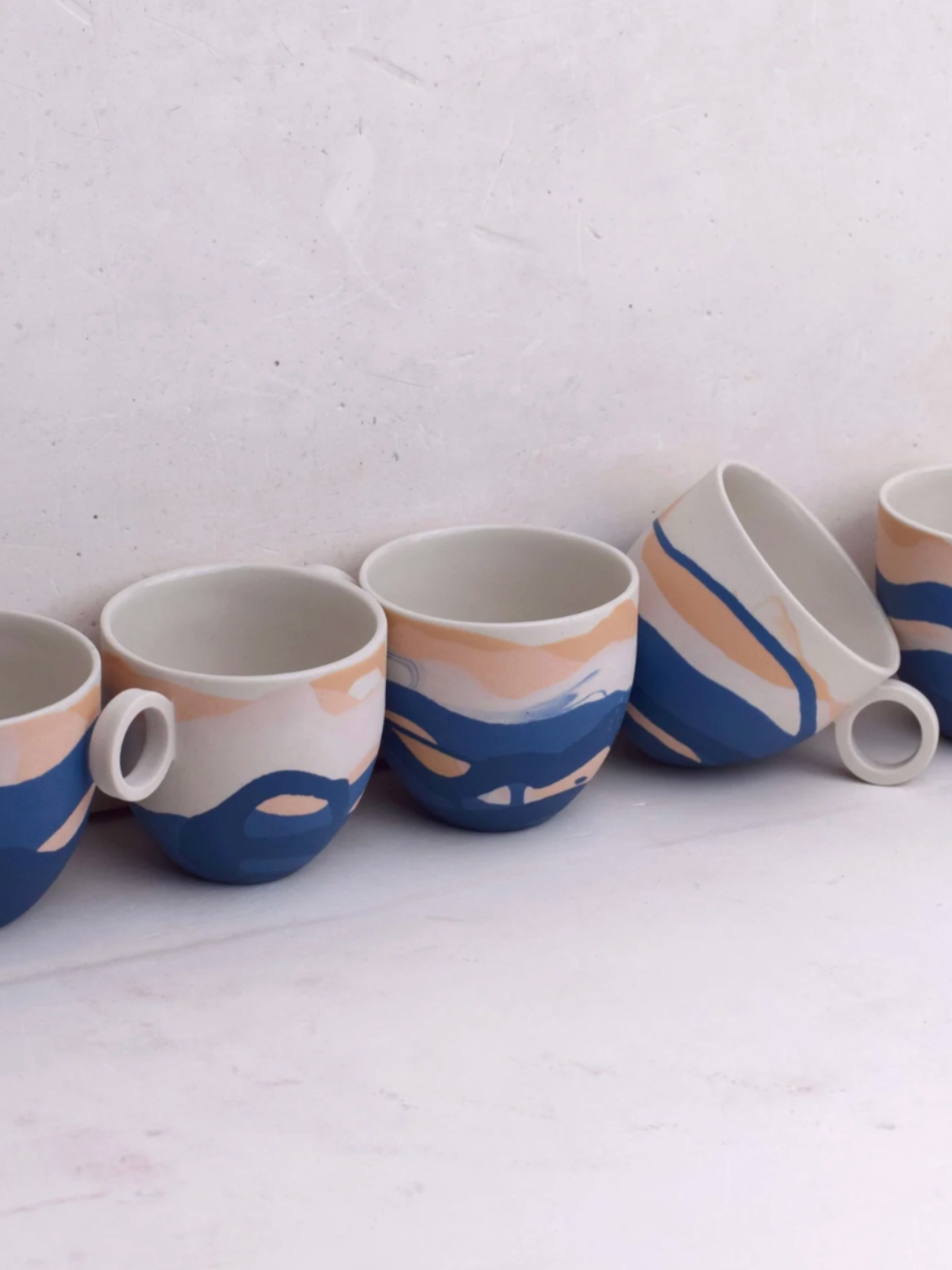 Shore Dreamlands Espresso Cup. A selection of cups from the Shore Dreamlands collection, showing typical variation in decoration.