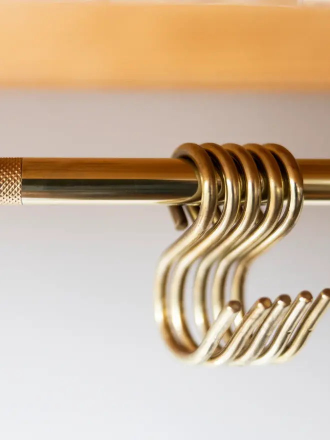 The Brass Hanging Rail