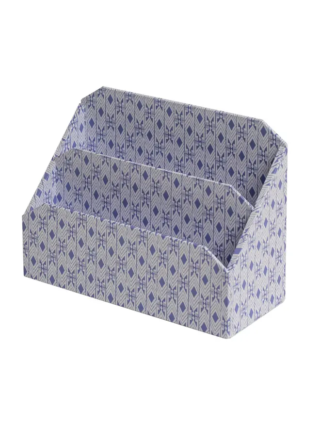 Tijan Letter Rack, a colourful patterned letter rack sitting on a white surface against a plain backdrop. 