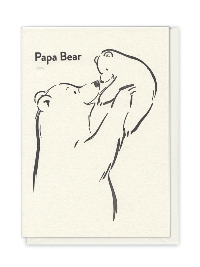 Greeting Card for Dad with a daddy bear holding aloft baby bear.  Black ink on cream paper, letterpress printed. Simple line illustration with Papa Bear wording and a blind debossed heart detail.