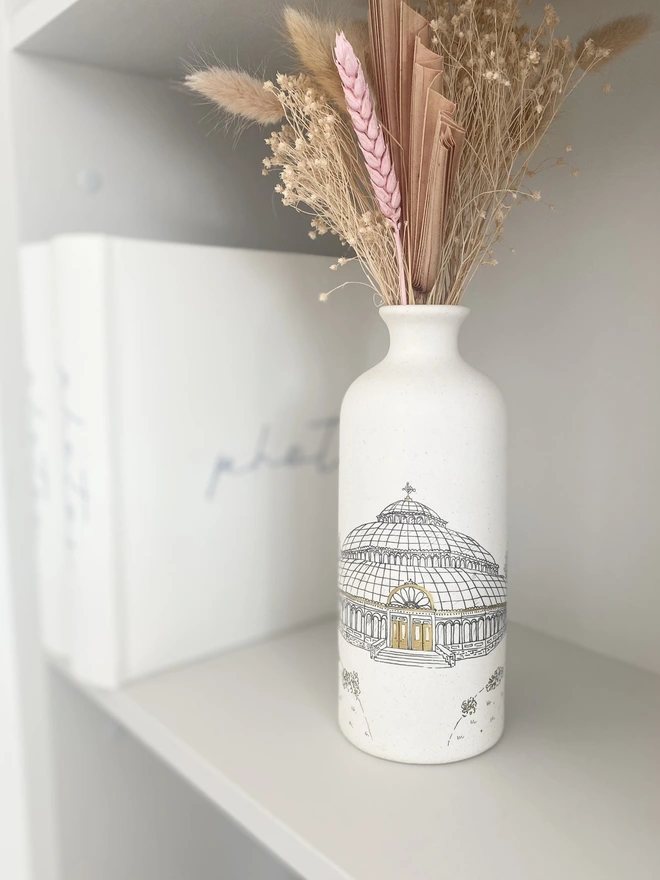 Ceramic vase with black hand drawn venue illustration featuring metallic gold highlights 
