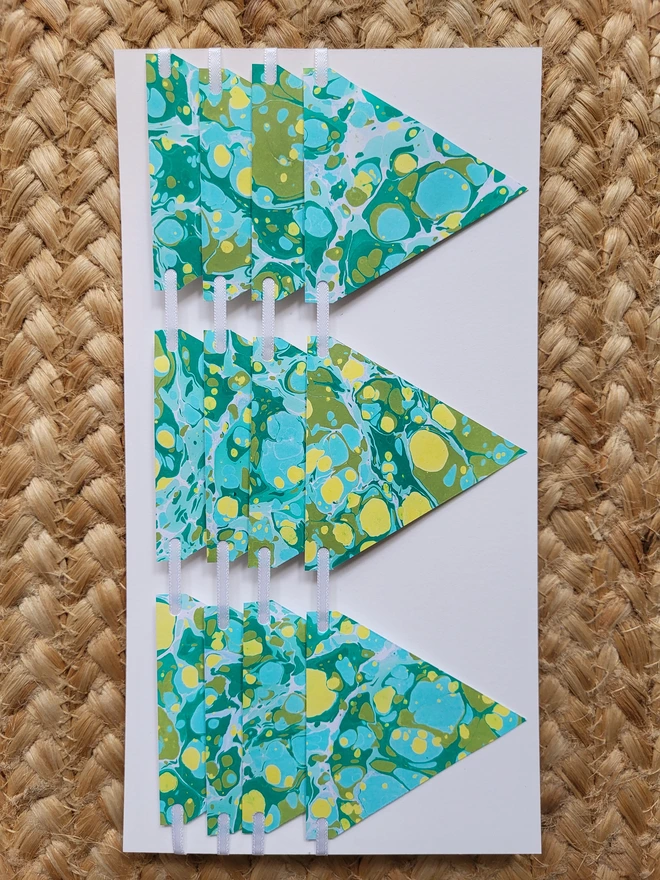 Hand-marbled paper bunting in green tones