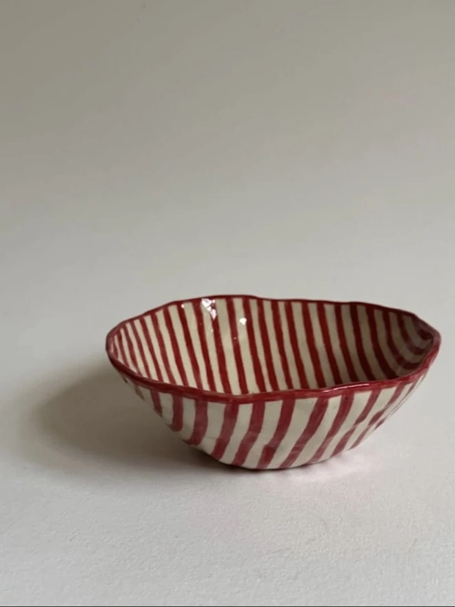 'Stella' Small Bowl, a small ceramic bowl sitting above a plan white surface