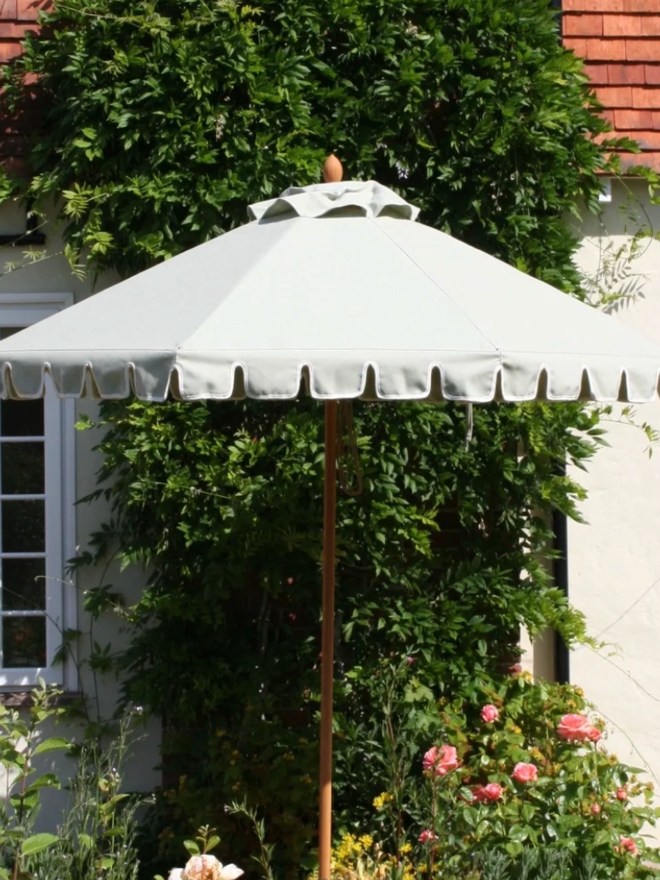 Light Green Castellated Parasol. A parasol in green. 